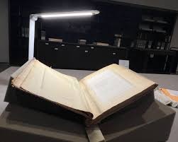 A color photograph of the records of the Society to Encourage Studies at Home on public display.